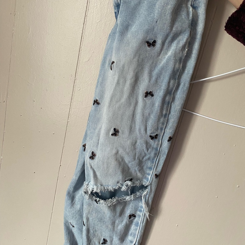 Light Blue Distressed Women's Jeans with Butterfly Embroidery